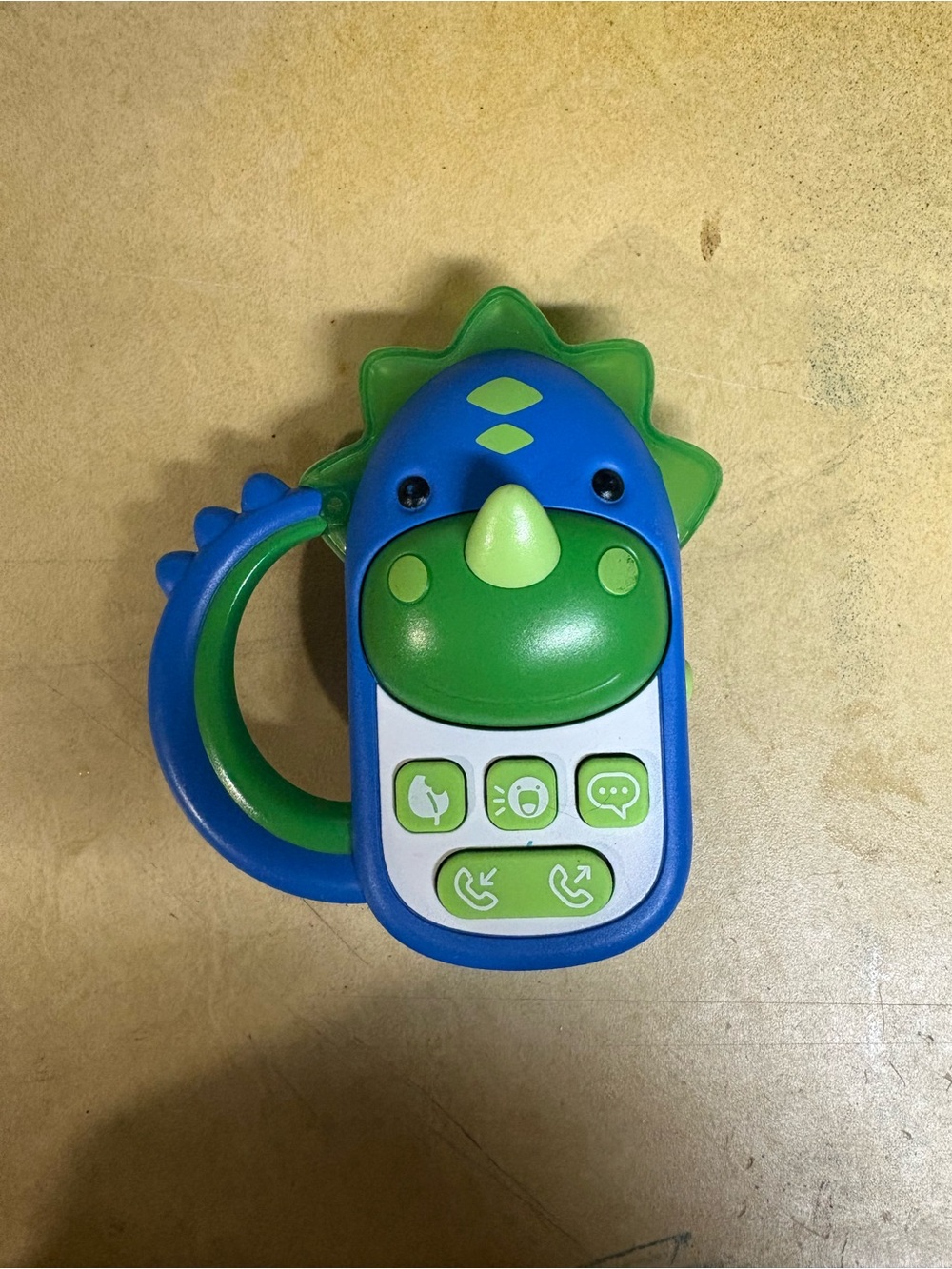 Blue and Green Dinosaur Toy Phone
